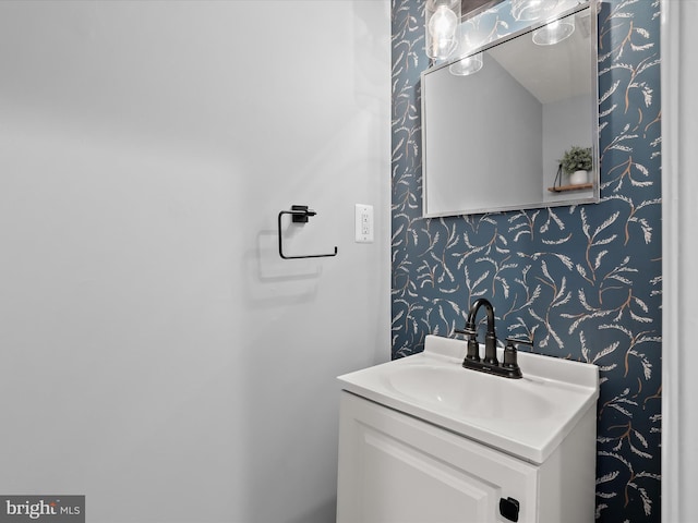 1614 Patapsco St, Baltimore, MD 21230 - bathroom with wallpapered walls and vanity