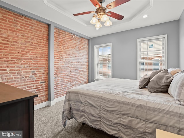 1614 Patapsco St, Baltimore, MD 21230 - carpeted bedroom featuring brick wall, recessed lighting, a tray ceiling, and a ceiling fan
