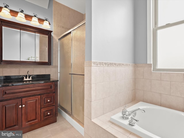 1614 Patapsco St, Baltimore, MD 21230 - bathroom with a bath, vanity, a shower stall, and tile patterned flooring