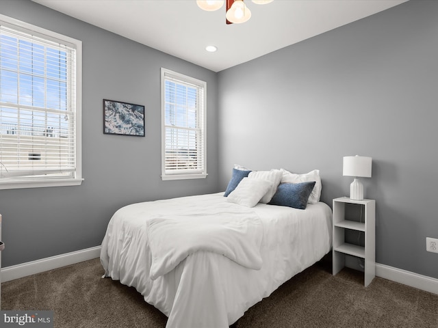 1614 Patapsco St, Baltimore, MD 21230 - carpeted bedroom with multiple windows