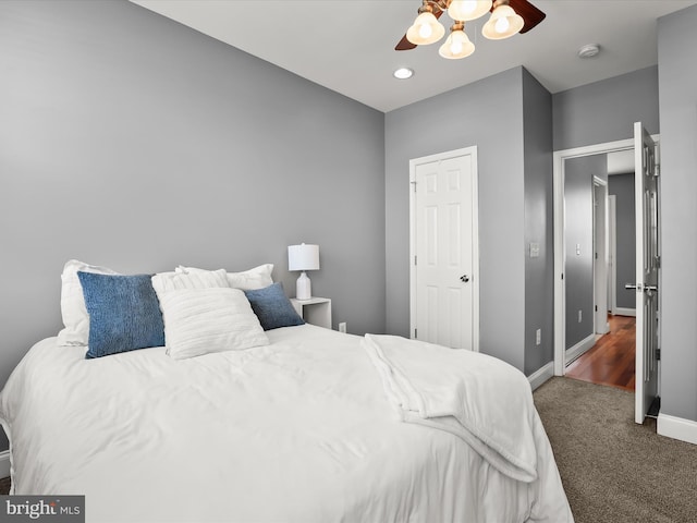 1614 Patapsco St, Baltimore, MD 21230 - carpeted bedroom featuring baseboards and a ceiling fan