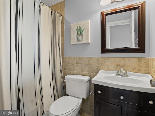 1614 Patapsco St, Baltimore, MD 21230 - bathroom featuring tile walls, vanity, wainscoting, and a shower with curtain