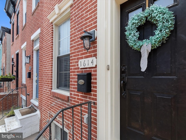 1614 Patapsco St, Baltimore, MD 21230 - property entrance with brick siding