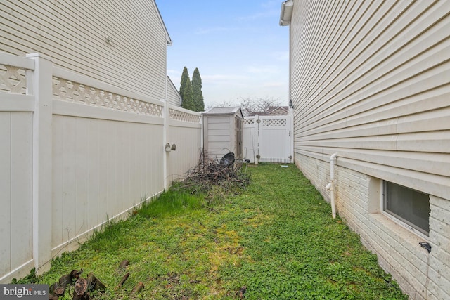 8509 Lexington Dr, Severn, MD 21144 - view of yard with a fenced backyard and a gate