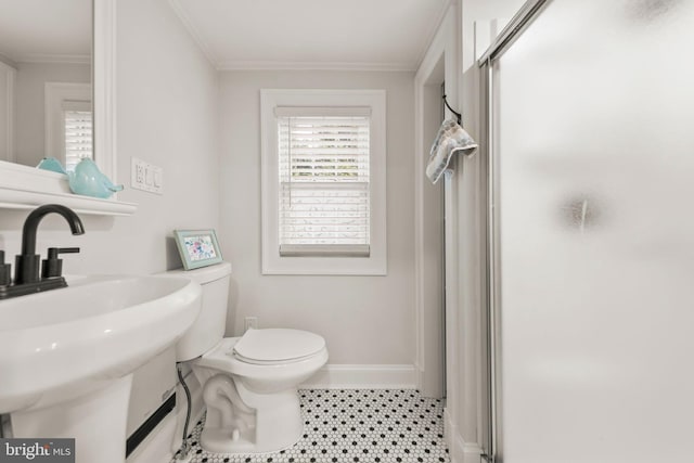 512 Dunlap St, Winchester, VA 22601 - bathroom with toilet, a stall shower, baseboards, a sink, and ornamental molding