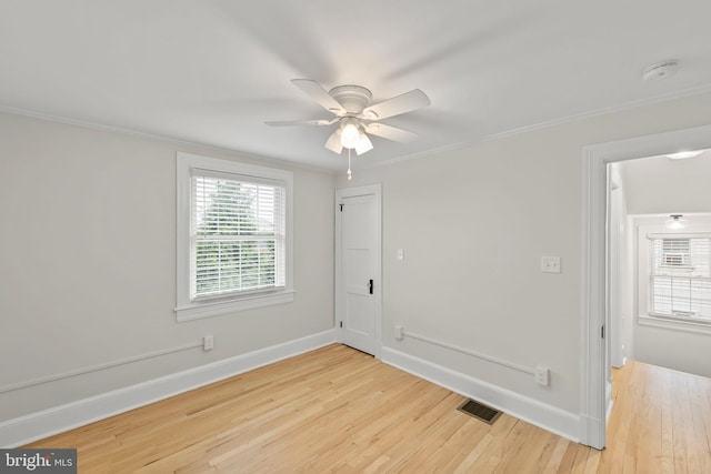 512 Dunlap St, Winchester, VA 22601 - unfurnished room with wood finished floors, ceiling fan, baseboards, a smoke detector, and ornamental molding