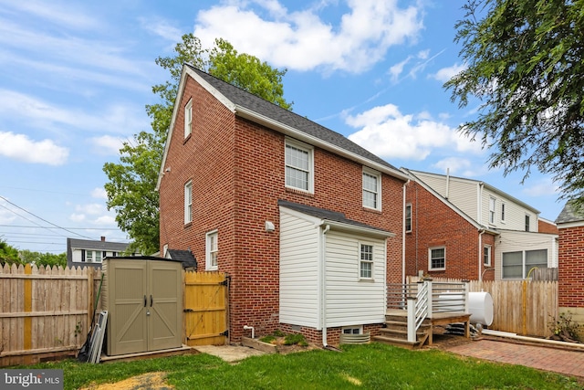 512 Dunlap St, Winchester, VA 22601 - back of house with a deck and brick siding