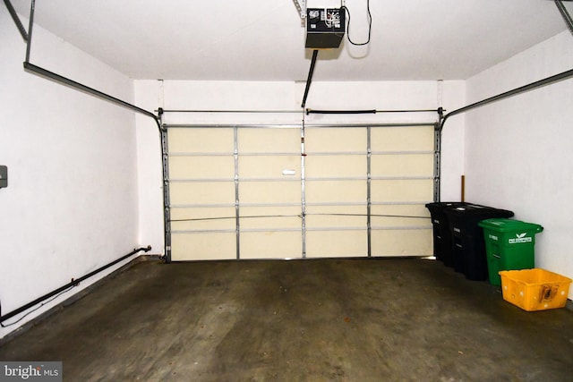 garage featuring a garage door opener
