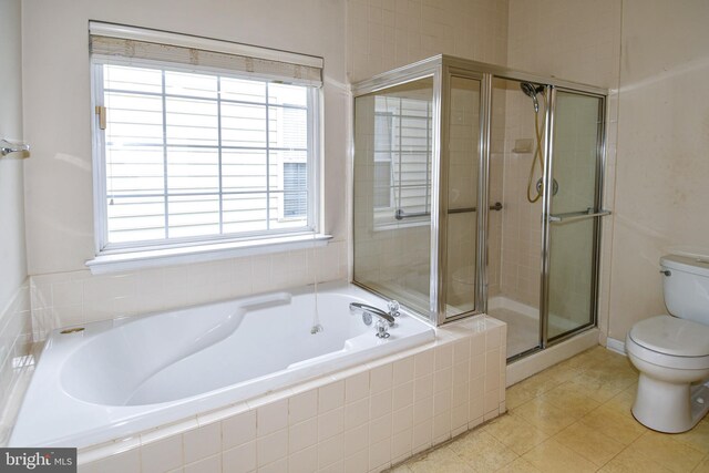 bathroom with a bath, tile patterned flooring, toilet, and a stall shower