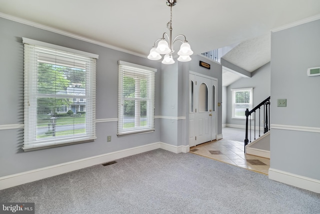 unfurnished dining area with stairs, a notable chandelier, crown molding, and carpet floors