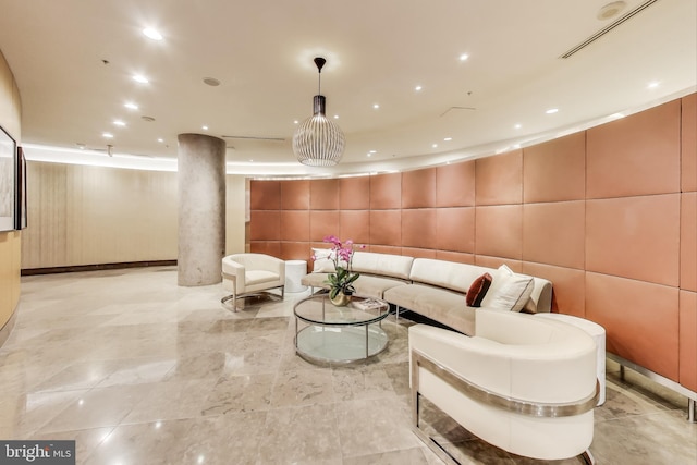 living area featuring recessed lighting