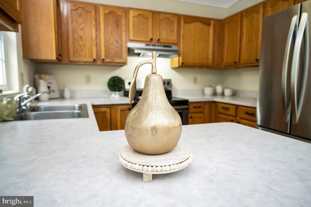 55 Hamn, Stafford, VA 22554 - kitchen with a sink, freestanding refrigerator, under cabinet range hood, light countertops, and stove