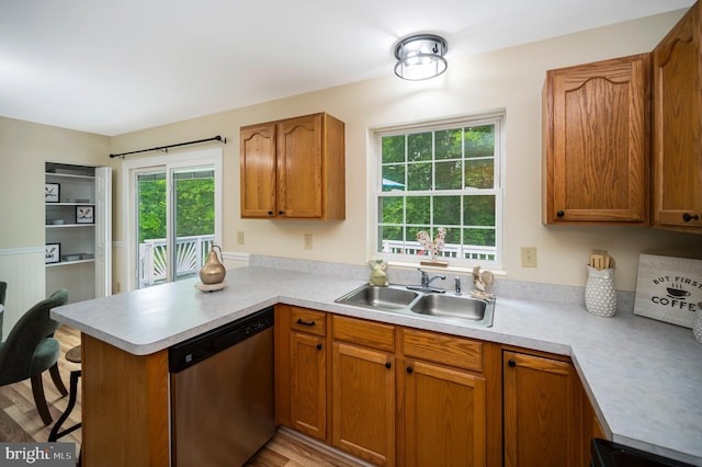 55 Hamn, Stafford, VA 22554 - kitchen featuring a sink, stainless steel dishwasher, a peninsula, and light countertops