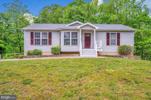 55 Hamn, Stafford, VA 22554 - ranch-style home featuring a shingled roof and a front yard