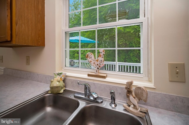 55 Hamn, Stafford, VA 22554 - room details with a sink, light countertops, and brown cabinets