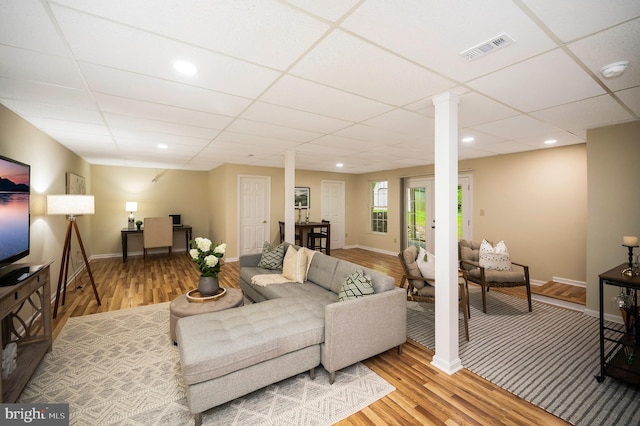 55 Hamn, Stafford, VA 22554 - living room featuring a paneled ceiling, visible vents, and wood finished floors