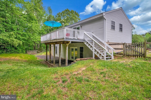55 Hamn, Stafford, VA 22554 - rear view of house with french doors, fence, a wooden deck, stairway, and a yard