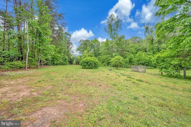 55 Hamn, Stafford, VA 22554 - view of yard featuring a forest view and fence