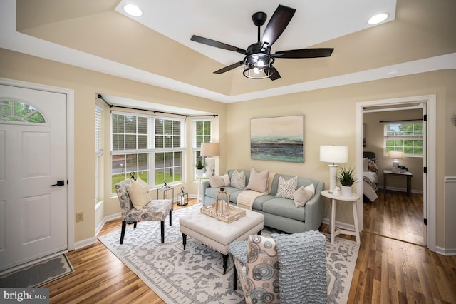 55 Hamn, Stafford, VA 22554 - living room featuring wood finished floors, recessed lighting, ceiling fan, a tray ceiling, and baseboards