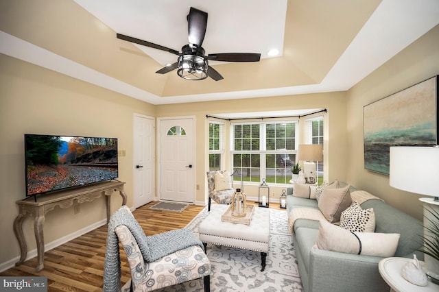55 Hamn, Stafford, VA 22554 - living area featuring baseboards, wood finished floors, a raised ceiling, and ceiling fan