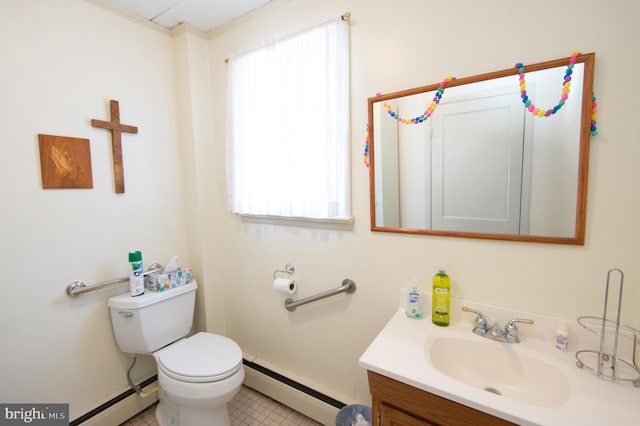 bathroom with toilet, vanity, a baseboard heating unit, and baseboard heating