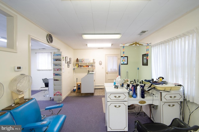miscellaneous room with dark carpet, visible vents, and a baseboard radiator