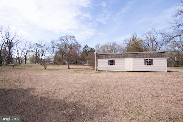 exterior space featuring an outbuilding