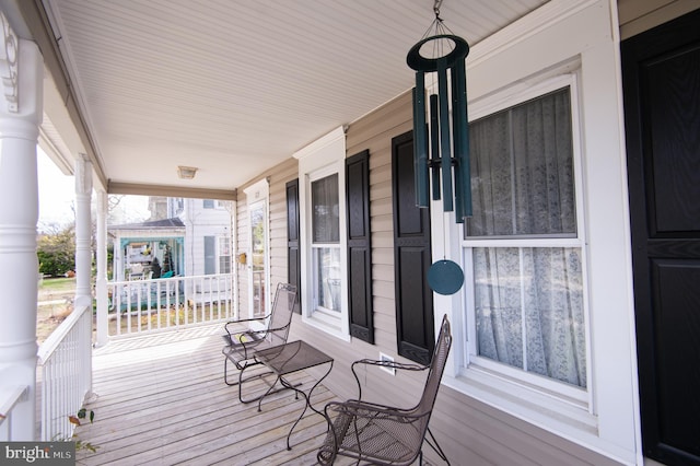 wooden deck featuring a porch