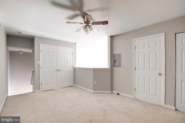1055 Gardenview Loop Unit 402, Woodbridge, VA 22191 - unfurnished bedroom with ceiling fan, baseboards, electric panel, and carpet floors