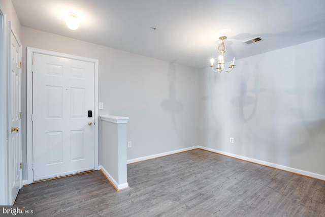 1055 Gardenview Loop Unit 402, Woodbridge, VA 22191 - interior space featuring visible vents, baseboards, a chandelier, and wood finished floors