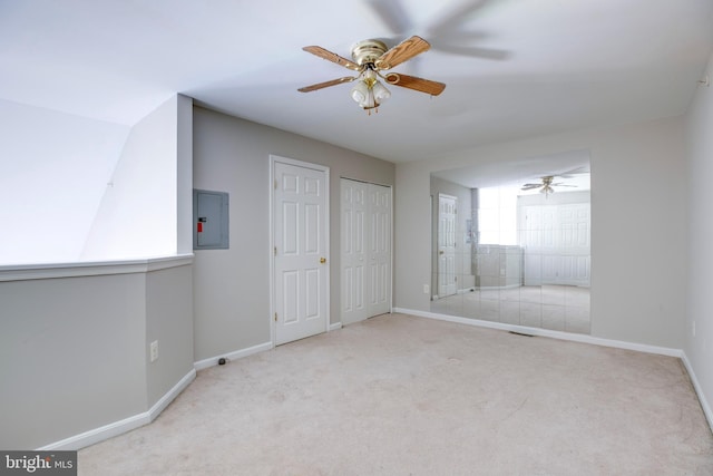 1055 Gardenview Loop Unit 402, Woodbridge, VA 22191 - unfurnished bedroom with baseboards, electric panel, carpet flooring, two closets, and ceiling fan