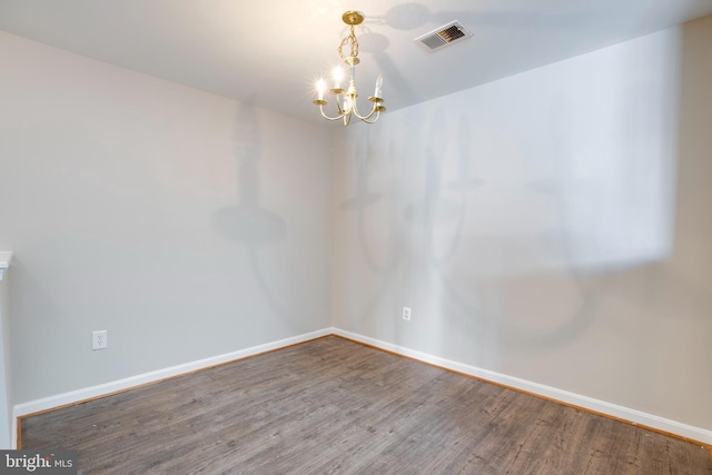 1055 Gardenview Loop Unit 402, Woodbridge, VA 22191 - spare room with a chandelier, visible vents, baseboards, and wood finished floors