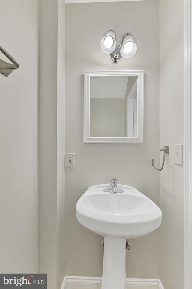 bathroom featuring baseboards