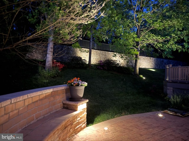 view of yard with fence and a patio area
