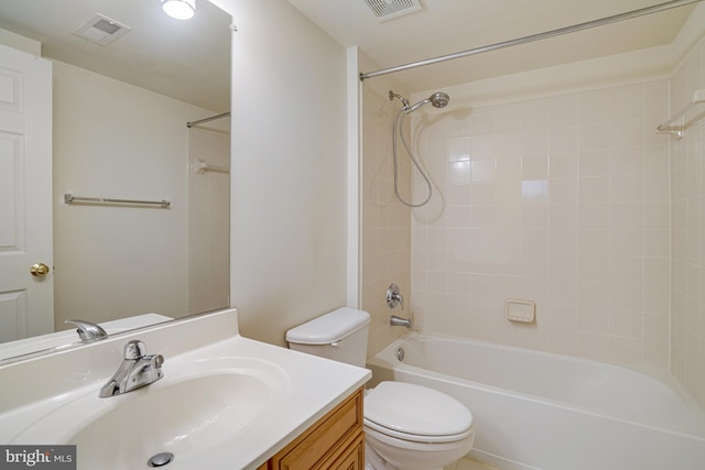 full bathroom featuring visible vents, shower / bathing tub combination, toilet, and vanity