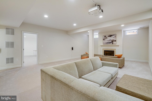 living room with light colored carpet and visible vents