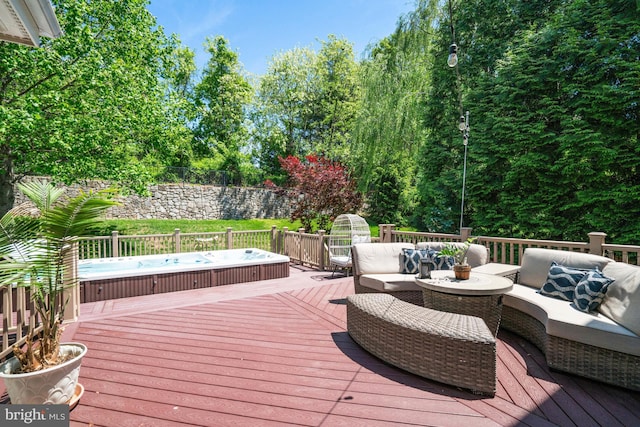 wooden terrace with outdoor lounge area