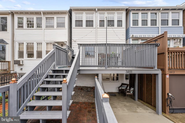 rear view of house with stairway