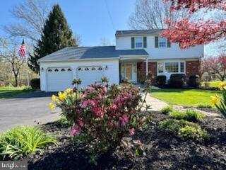 1210 Anders Rd, Lansdale, PA 19446 - traditional-style home featuring a garage and asphalt driveway