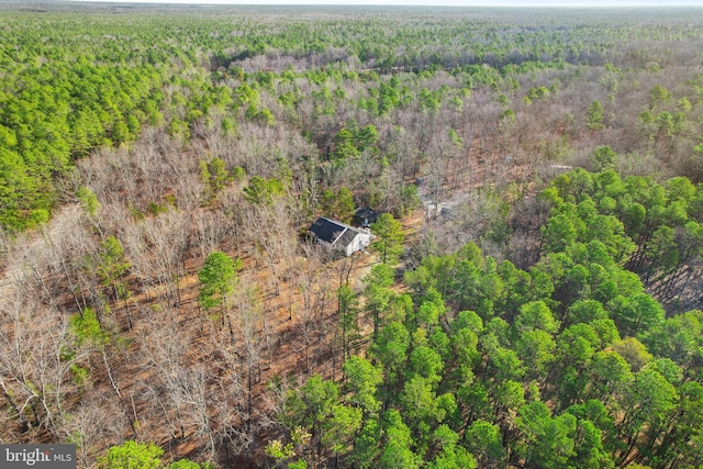 drone / aerial view with a view of trees