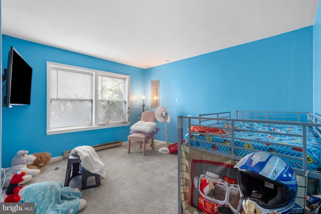 bedroom with a baseboard heating unit, carpet floors, electric panel, and baseboards