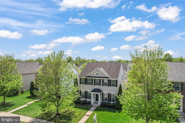 view of front facade with a front yard