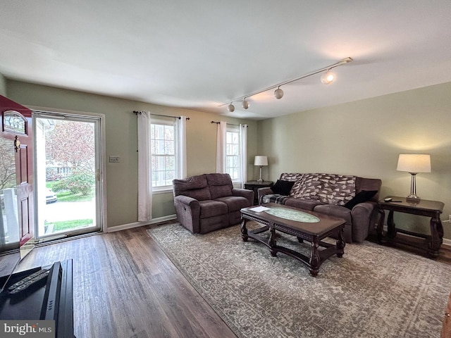 1200 Price Ln, Downingtown, PA 19335 - living room featuring track lighting, wood finished floors, and baseboards