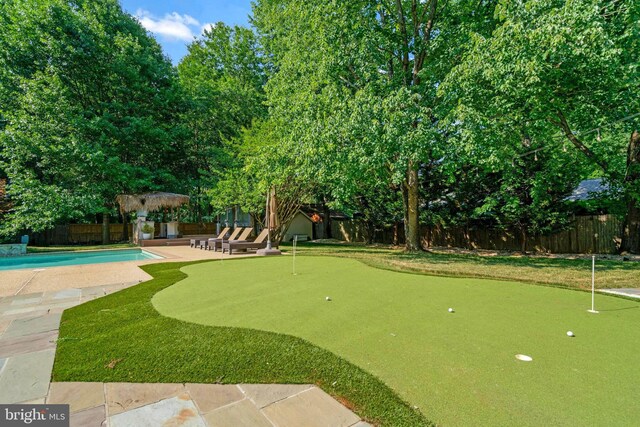 2504 Sherwood Hall Ln, Alexandria, VA 22306 - surrounding community featuring a fenced backyard, a swimming pool, and a patio