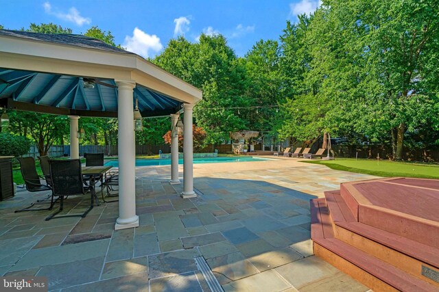 2504 Sherwood Hall Ln, Alexandria, VA 22306 - view of patio / terrace featuring a gazebo, an outdoor pool, and a fenced backyard