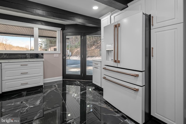doorway featuring plenty of natural light, baseboards, marble finish floor, and recessed lighting