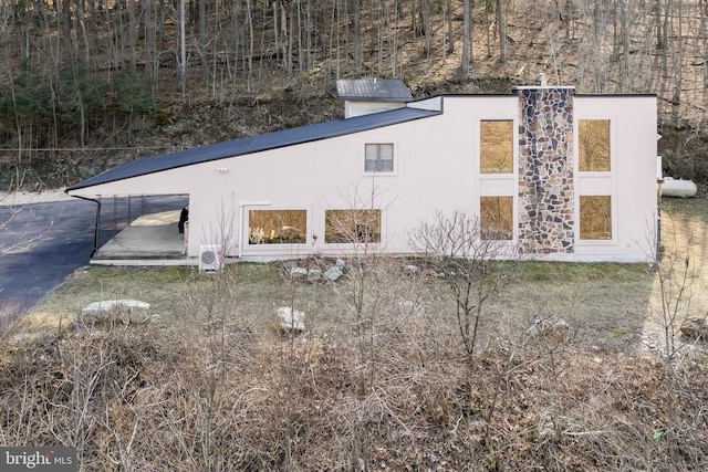 view of property exterior with stucco siding