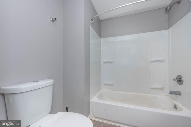 2110 E Hoffman St, Baltimore, MD 21213 - bathroom featuring toilet and shower / tub combination
