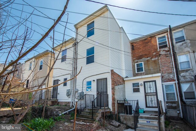 2110 E Hoffman St, Baltimore, MD 21213 - rear view of property with brick siding