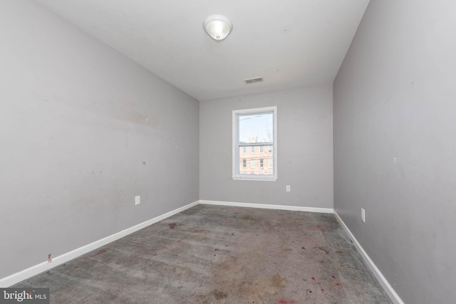 2118 E Hoffman St, Baltimore, MD 21213 - empty room with baseboards, carpet floors, and visible vents